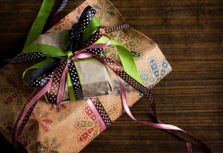 A Gift For The Holiday With Colorful Ribbons